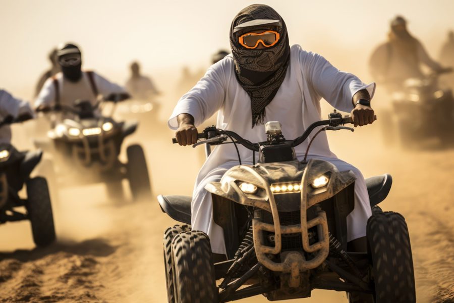 vecteezy_ai-generated-arab-men-ride-buggies-in-the-desert-near-dubai_41299159